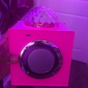 A Bluetooth speaker wit lights at the top